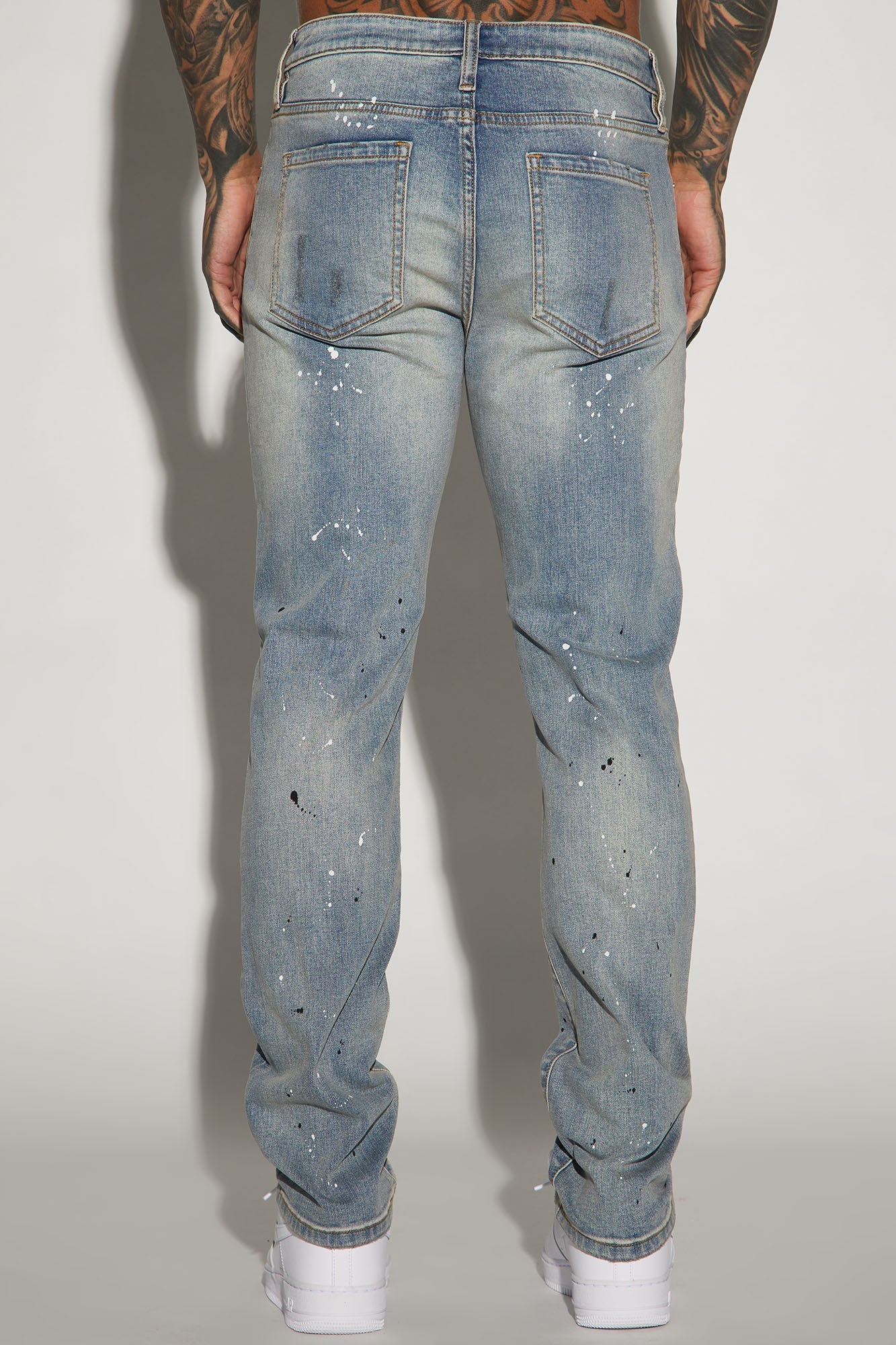 Ripped And Bleach Splatter Slim Jeans - Light Blue Wash - image 4
