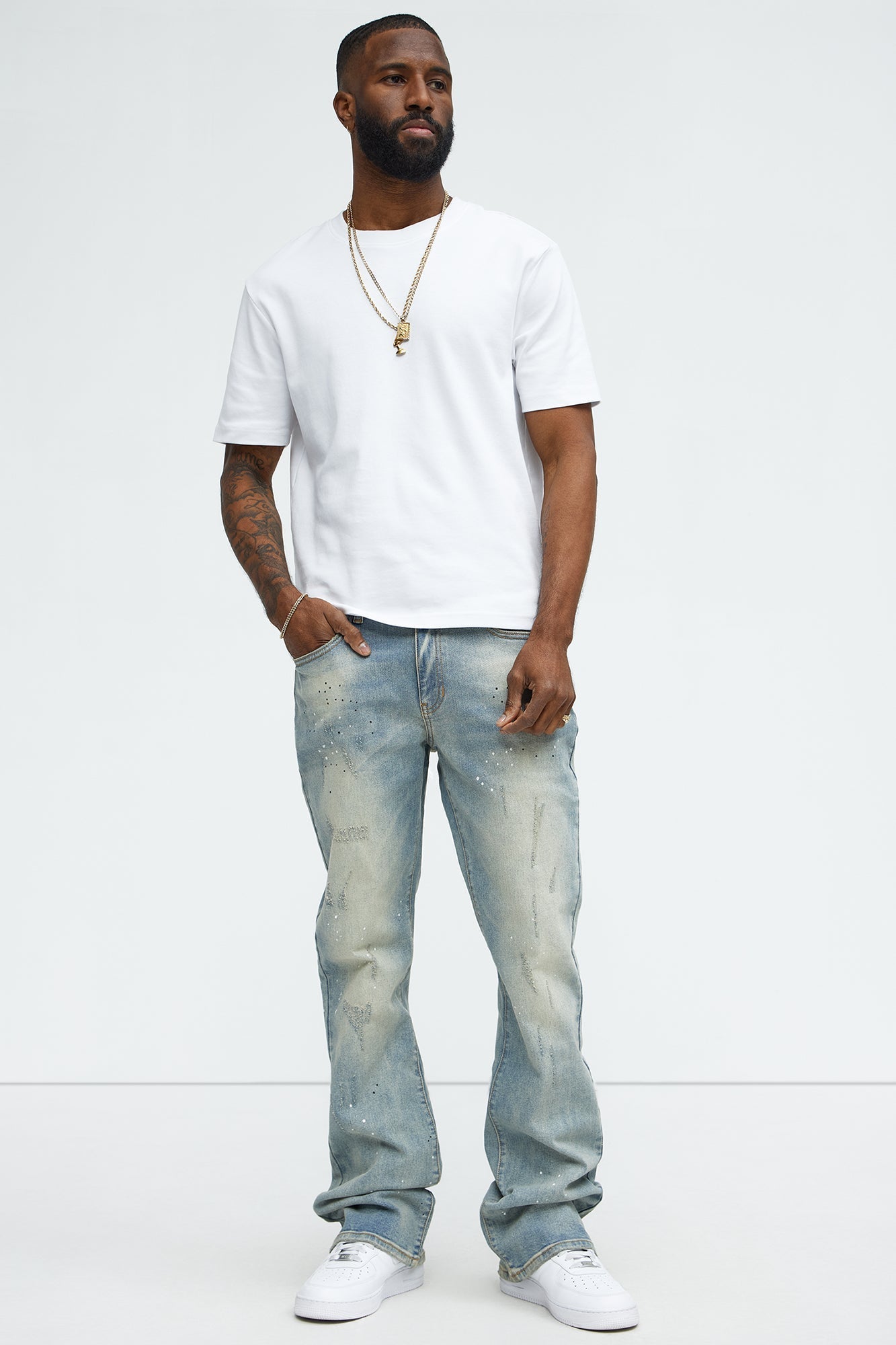Ripped And Bleach Splatter Stacked Slim Flare Jeans - Light Blue Wash - image 2