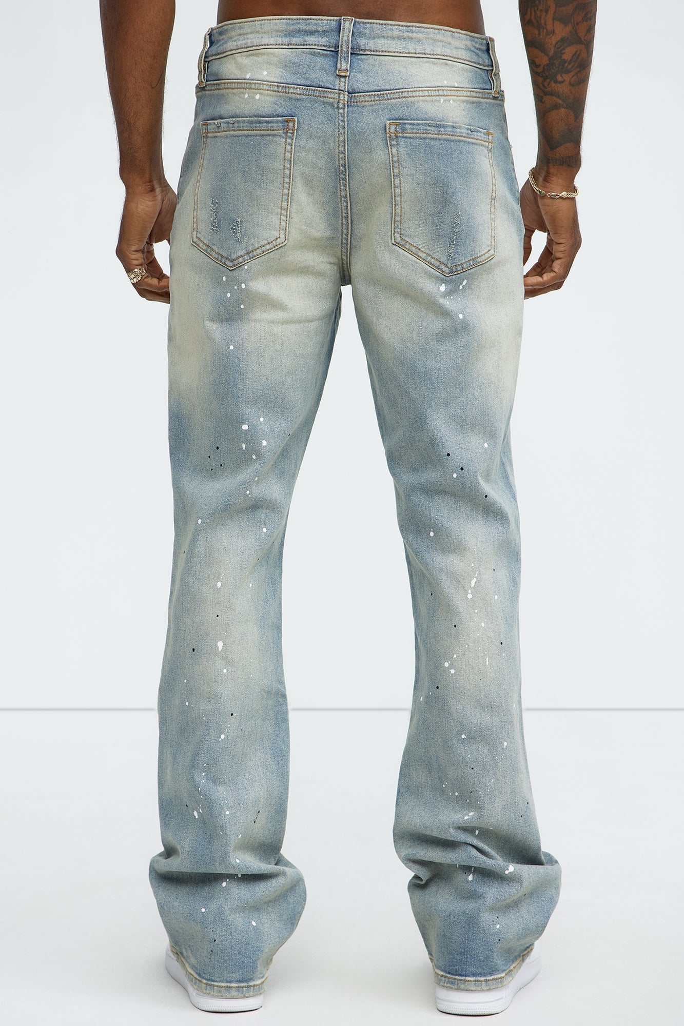 Ripped And Bleach Splatter Stacked Slim Flare Jeans - Light Blue Wash - image 4