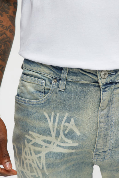 Graffiti Art Stacked Skinny Jeans - Light Wash - image 3