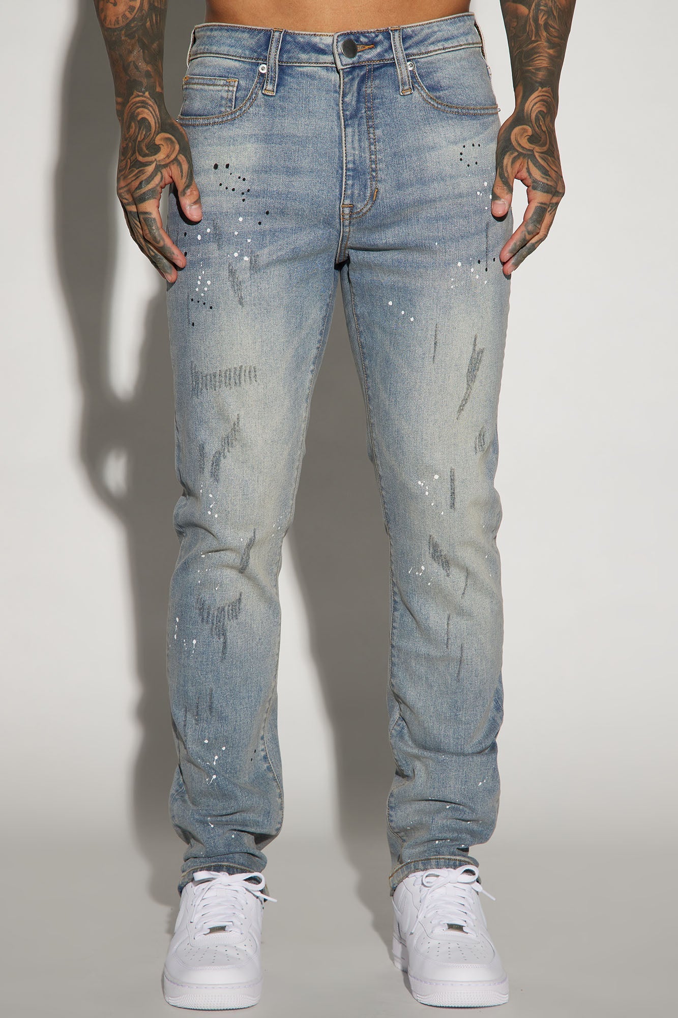 Ripped And Bleach Splatter Slim Jeans - Light Blue Wash - image 1