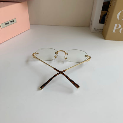 Miu Miu 2026 Oval Frame Glasses — Women's Minimalist Eyewear